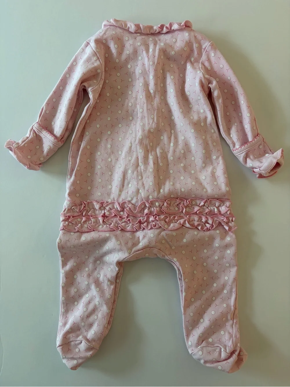 Magnolia baby pink footie with golf cart and golf ball print 3Mo